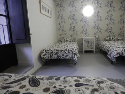 Cama o camas de una habitación en Plaza Catedral hostel