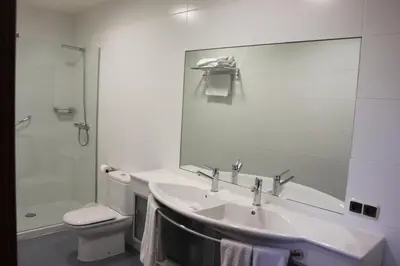 Un baño de Apartamentos Irati