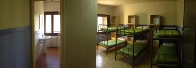 Cama o camas de una habitación en Casa de Colònies Vall de Boí - Verge Blanca
