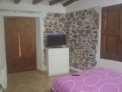 Una televisión o centro de entretenimiento en Can Peiri