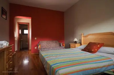 Cama o camas de una habitación en Albergue Casa Salinas