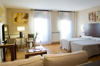 Cama o camas de una habitación en SNÖ Hotel Ciudad de Sabiñánigo
