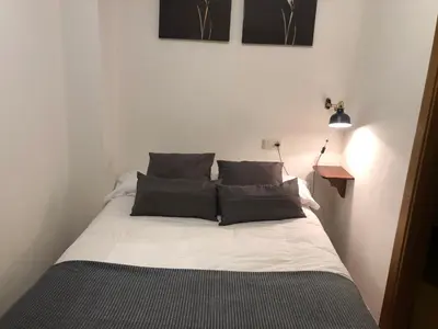 Cama o camas de una habitación en Apartamentos Los Lagos