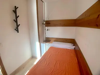 Cama o camas de una habitación en Apartamentos Los Lagos