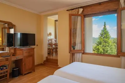Una televisión o centro de entretenimiento en Hotel Can Boix de Peramola
