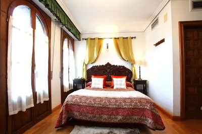 Cama o camas de una habitación en Hotel Merindad de Olite