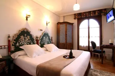 Cama o camas de una habitación en Hotel Merindad de Olite