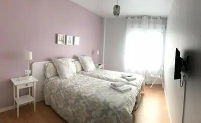 Cama o camas de una habitación en Alojamientos Olga