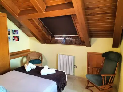 Cama o camas de una habitación en La Lucana Ordesa Ainsa apartamento