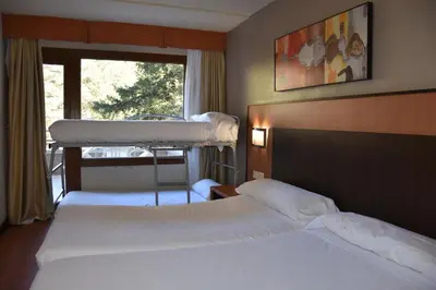 Cama o camas de una habitación en Hotel SNÖ Edelweiss