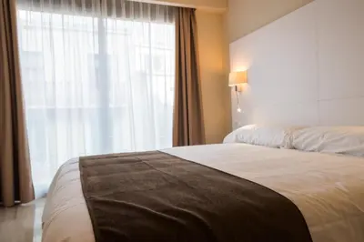 Cama o camas de una habitación en Apartaments Peronel.la