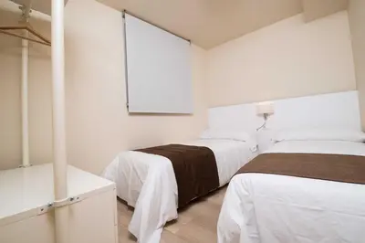 Cama o camas de una habitación en Apartaments Peronel.la