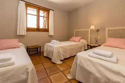 Cama o camas de una habitación en Casa Joan de Fontsagrada
