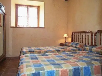 Cama o camas de una habitación en Palacio Lerruz I y Palacio Lerruz II