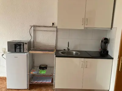 Una cocina o zona de cocina en Montrebei Casa González Apartamentos