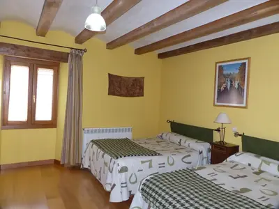 Cama o camas de una habitación en Casa Rural Iturrieta