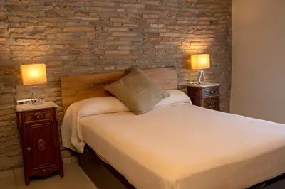 Cama o camas de una habitación en Plaza Apartamentos