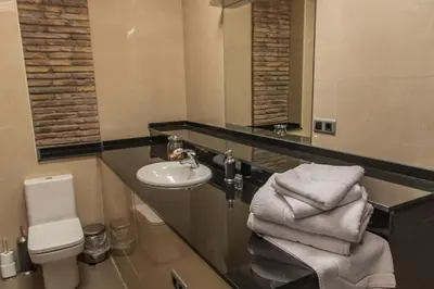 Un baño de Plaza Apartamentos