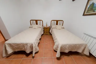 Cama o camas de una habitación en Casa Rural El Solanar