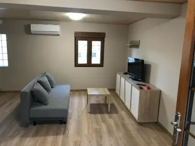 Una televisión o centro de entretenimiento en Casa la Barbacana