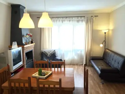 Una televisión o centro de entretenimiento en Casa la Barbacana