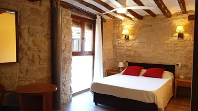 Cama o camas de una habitación en Alojamiento La Fresneda