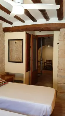 Cama o camas de una habitación en Alojamiento La Fresneda