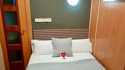 Cama o camas de una habitación en Hotel Paris Centro