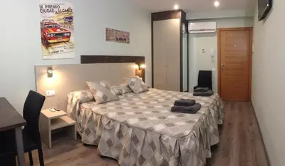 Cama o camas de una habitación en Apartamentos de turismo rural Las Eras