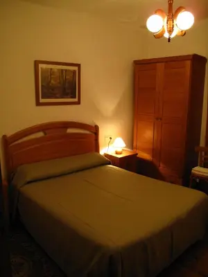 Cama o camas de una habitación en Casa Rural López Ordesa