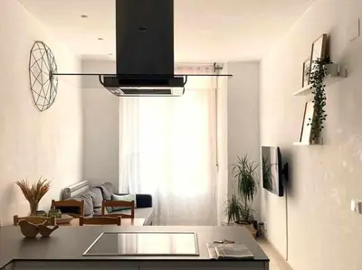 Una televisión o centro de entretenimiento en Apartamento Ayla San Fermín