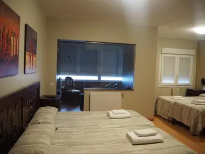 Cama o camas de una habitación en Hostal Acella