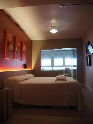 Cama o camas de una habitación en Hostal Acella