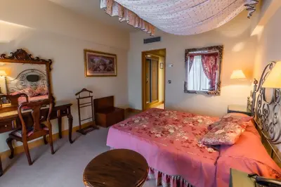 Cama o camas de una habitación en Hotel Alhama