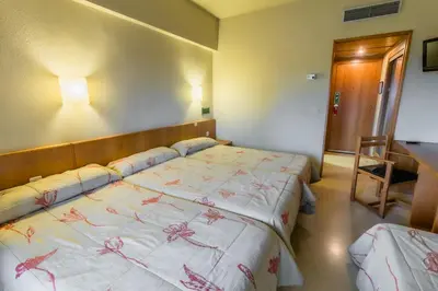 Cama o camas de una habitación en Hotel Alhama