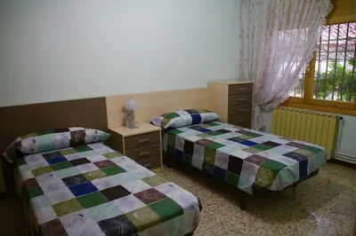 Cama o camas de una habitación en CASA LA FÀBRICA