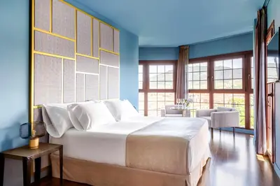 Cama o camas de una habitación en Pamplona Catedral Hotel