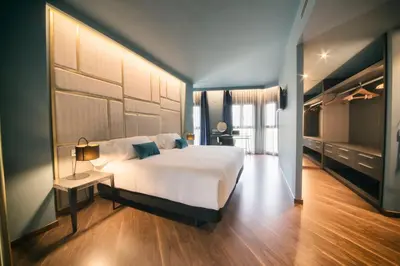 Cama o camas de una habitación en Pamplona Catedral Hotel