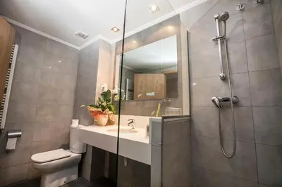 Un baño de Hotel Victor