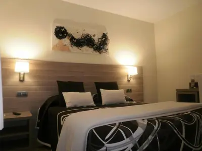 Cama o camas de una habitación en Hotel Victor