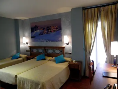 Cama o camas de una habitación en Hotel Arnal