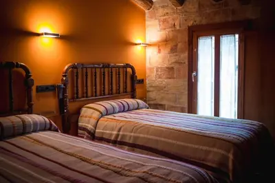 Cama o camas de una habitación en A Corona del Reino