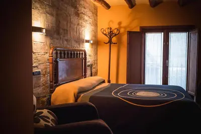 Cama o camas de una habitación en A Corona del Reino