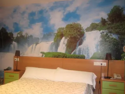 Cama o camas de una habitación en Hotel Restaurante Caracho