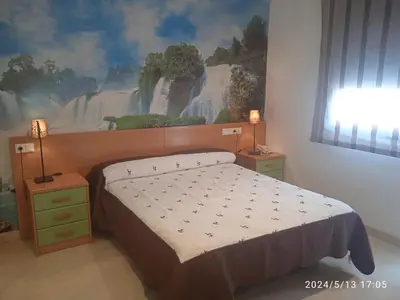 Cama o camas de una habitación en Hotel Restaurante Caracho