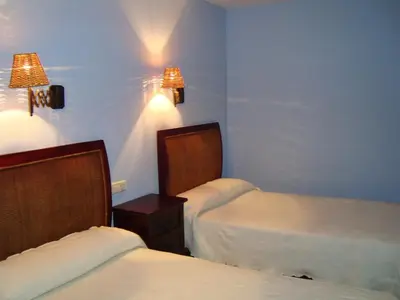 Cama o camas de una habitación en Hotel Charle