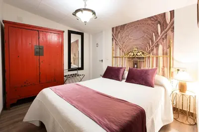 Cama o camas de una habitación en Hotel Villa San Jorge