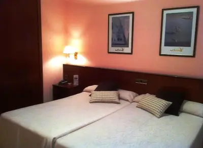 Cama o camas de una habitación en Hotel La Seu