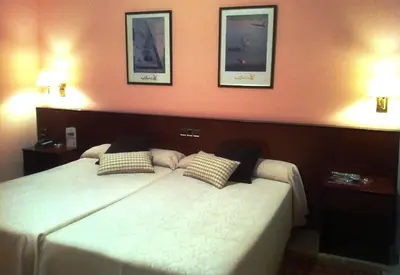 Cama o camas de una habitación en Hotel La Seu