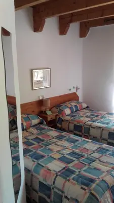 Cama o camas de una habitación en Hostal Rural Casa Pedro